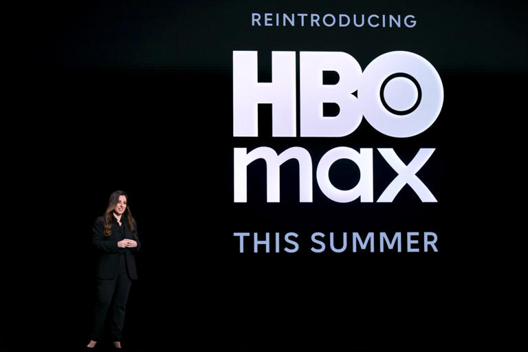 Max streaming platform interface on mobile and TV showing HBO and Discovery content